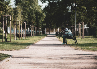 A thinking man sitting in the park 