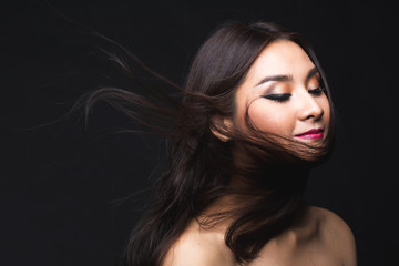 Portrait of young asian woman with makeup long hair.