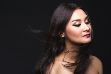 Fototapeta premium Portrait of young asian woman with makeup long hair.
