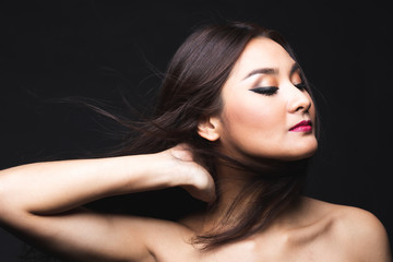 Fototapeta premium Portrait of young asian woman with makeup long hair.
