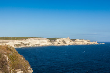 Fototapeta na wymiar View of Bonifacio wild coast cliff rocks, Corsica island, France