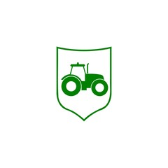 Green Tractor on shield icon isolated on white background