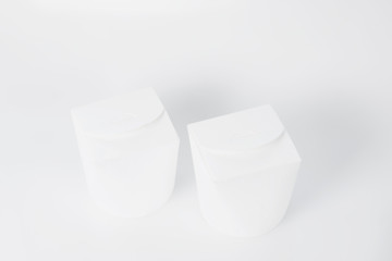 Close up picture of two white boxes