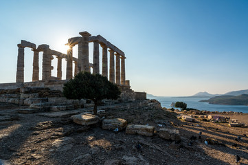 Sun Shining Through the Columns of the Temple of Poseidon at Cape Sounion, Greece