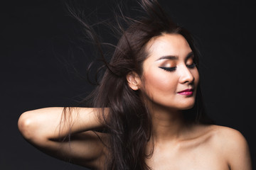 Naklejka premium Portrait of young asian woman with makeup long hair.