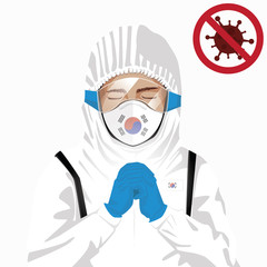 Covid-19 or Coronavirus concept. Korean medical staff wearing mask in protective clothing and praying for against Covid-19 virus outbreak in Korea. Korean man and Korea flag. Epidemic corona virus