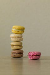 Fototapeta na wymiar Colorful macarons. Sweet French cakes.
