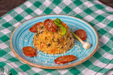 Rizotto chorizo parmesan garlic blue plate