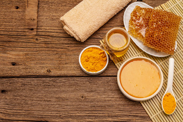 Spa concept. Self care with honey and turmeric. Natural organic cosmetics, homemade product, alternative lifestyle. Vintage background