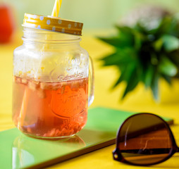 Iced tea with tropical fruits
