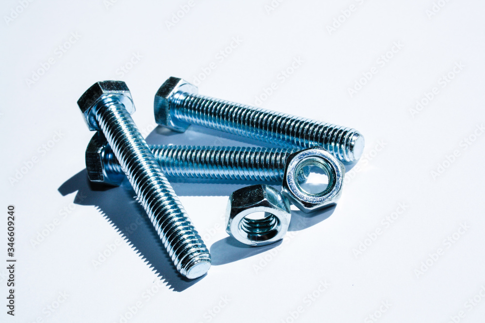 Wall mural screws and bolts in white background