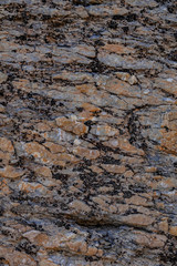 Rough Uneven Surface Texture of Wadi Ghul aka Grand Canyon of Oman in Jebel Shams Mountains. Vertical Photo