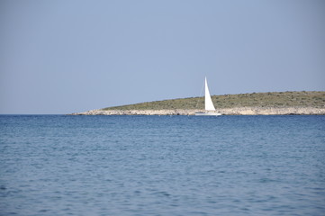 sailboat on the sea. Yacht defrost abandoned island
