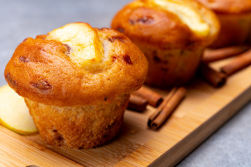 Fresh baked muffins with apple and cinnamon close up