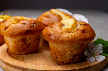Fresh baked muffins with apple and cinnamon close up