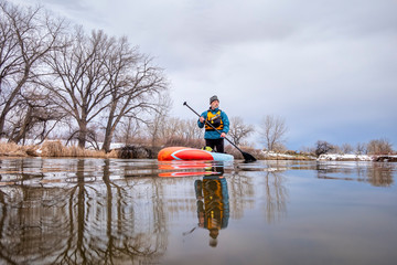 solo lake paddling as social distancing recreation