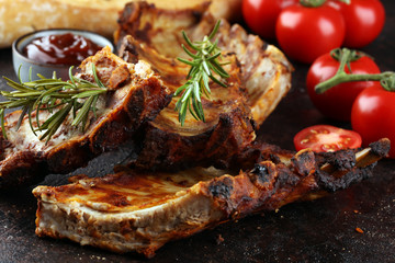 Grilled spare ribs for a tasty bbq meat with hot spicy barbecue sauce