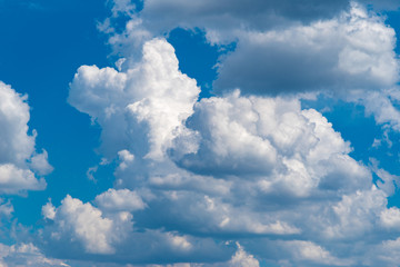 big clouds in the blue sky. Blue sky with heavy clouds background or texture