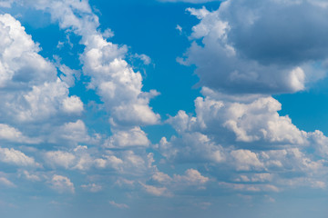 big clouds in the blue sky. Blue sky with heavy clouds background or texture