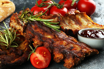 Grilled spare ribs for a tasty bbq meat with hot spicy barbecue sauce