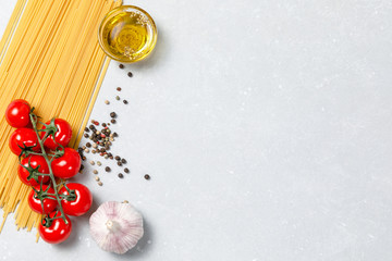 Ingredients for cooking traditional Italian pasta on white background with copy space