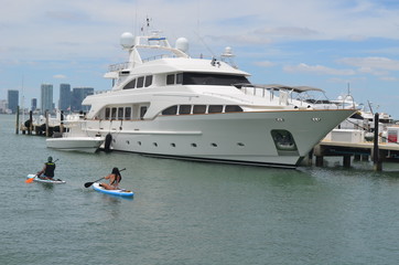 Fototapeta na wymiar Luxurious motor yacht moored at a Miami Beach,Florida marina.