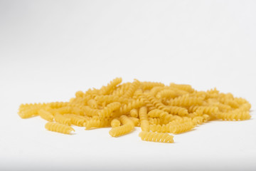 Twisted pasta on a white background