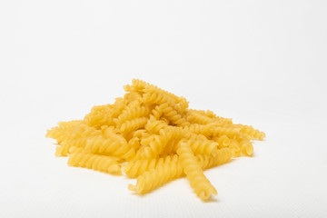 Twisted pasta on a white background