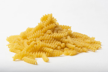 Twisted pasta on a white background