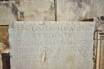The wall sign remains on the wall of Celsus Library, Ephesus,