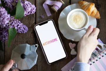 Call to stay at home during quarantine.Mobile phone in hands with # stay home
Quarantine and warning, outbreak alert on mobile phone.Stay home to stop the spread of COVID-19 coronavirus.Global Covid-1