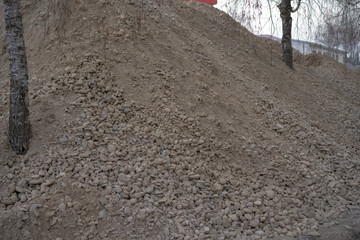 Sand and stones in a heap for construction