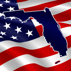 United States, Florida. Dark blue silhouette of the state on its borders on the background of the USA flag.