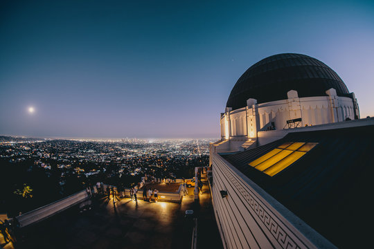 Griffith Observatory at night with Los Angeles skyline