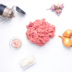 ingredients for meatballs isolated on white
