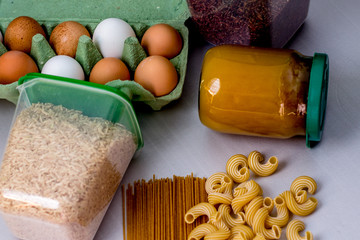 Donations food with eggs, pasta and rice. donate concept on table background