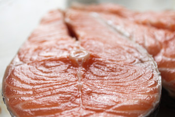 Fresh Raw Tasty Big Textured Salmon Steak in Macro Shot. Fish cooking concept. Healthy Diet Food. Seafood