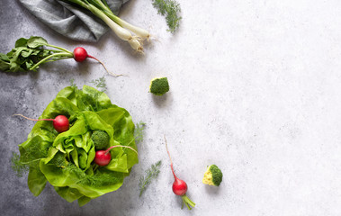 Top view vintage textured table decoration with fresh garden vegetables