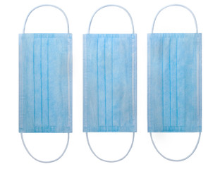 Three medical protective masks on white background of blue color