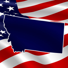 United States, Montana. Dark blue silhouette of the state on its borders on the background of the USA flag.