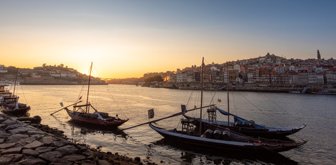 Panoramic of Porto cityscape in sunset with river on the front and wine carrier ship in  foreground and city of Porto in background, Portugal - 346638613