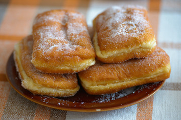 Obraz na płótnie Canvas Delicious bread sprinkled with sugar on top