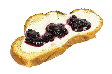 Slice of challah bread with cottage cheese and jam