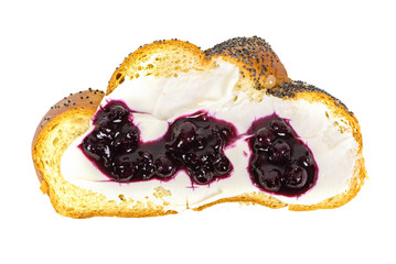 Top view of slice of challah bread with cheese and jam