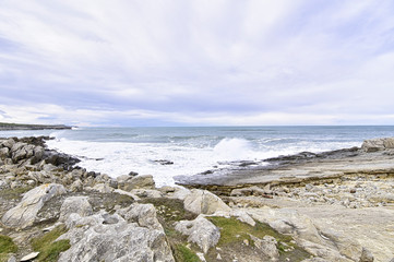 Fototapeta na wymiar choppy sea and waves along the coast