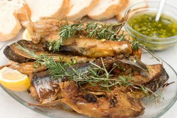 fried fish with rosemary