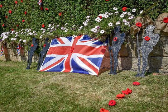Preparations streets  in Ackworth, West Yorkshire to   celebrate peace after years of devastating war. - Powered by Adobe