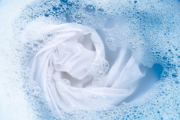 Soak a cloth before washing, white cloth