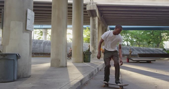 African American skateboarder on ramp