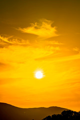 Yellow Sky, Sun, Silhouetted Ground 